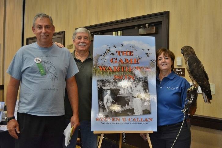 Author Steven T. Callan and friends at a book signing for The Game Warden's Son at the Pacific Flyway Decoy Association Festival