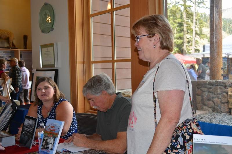 Authors Melanie Allen, Steven T. Callan, and Friend at Book Signing during Art and Wine Festival at Lassen Volcanic National Park