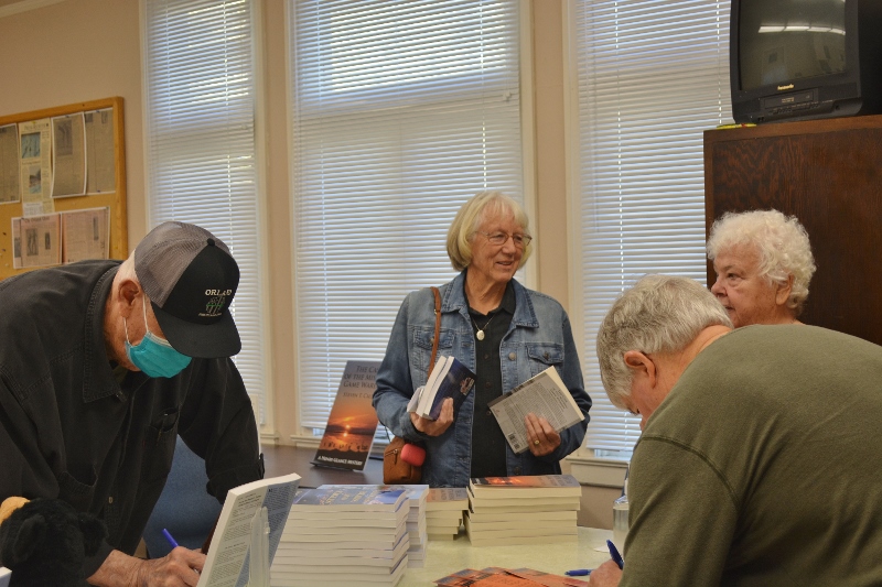Author Steven T. Callan meets new friends and signs copies of his books at the Orland Carnegie Community Center.