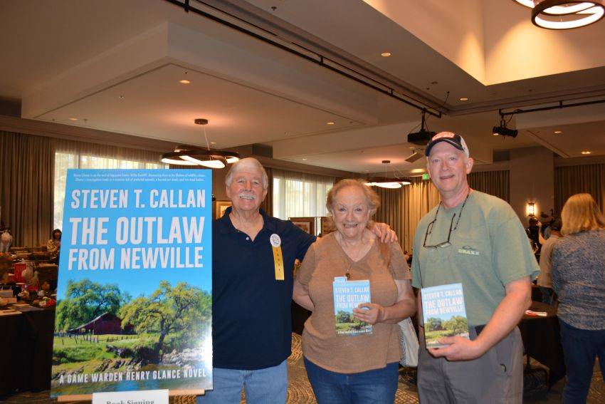Author Steven T. Callan and friends at a book signing celebrating the release of The Outlaw from Newville, his second novel in the Game Warden Henry Glance series, at the Pacific Flyway Decoy Association Wildfowl Classic