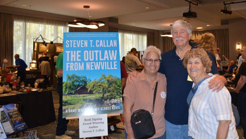 Author Steven T. Callan and friends at a book signing celebrating the release of The Outlaw from Newville, his second novel in the Game Warden Henry Glance series, at the Pacific Flyway Decoy Association Wildfowl Classic