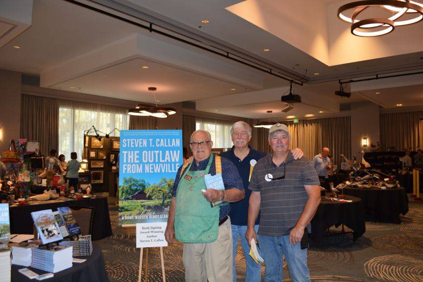Author Steven T. Callan and friends at a book signing celebrating the release of The Outlaw from Newville, his second novel in the Game Warden Henry Glance series, at the Pacific Flyway Decoy Association Wildfowl Classic