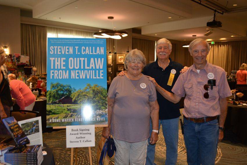 Author Steven T. Callan and friends at a book signing celebrating the release of The Outlaw from Newville, his second novel in the Game Warden Henry Glance series, at the Pacific Flyway Decoy Association Wildfowl Classic