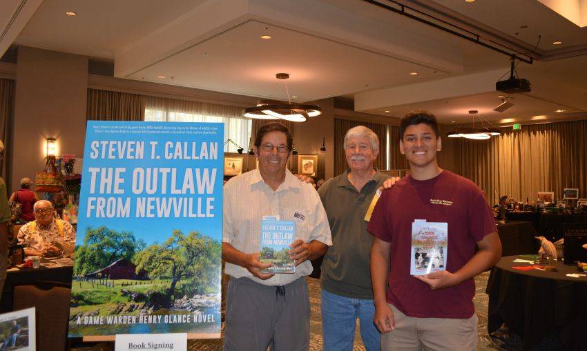Author Steven T. Callan and friends at a book signing celebrating the release of The Outlaw from Newville, his second novel in the Game Warden Henry Glance series, at the Pacific Flyway Decoy Association Wildfowl Classic