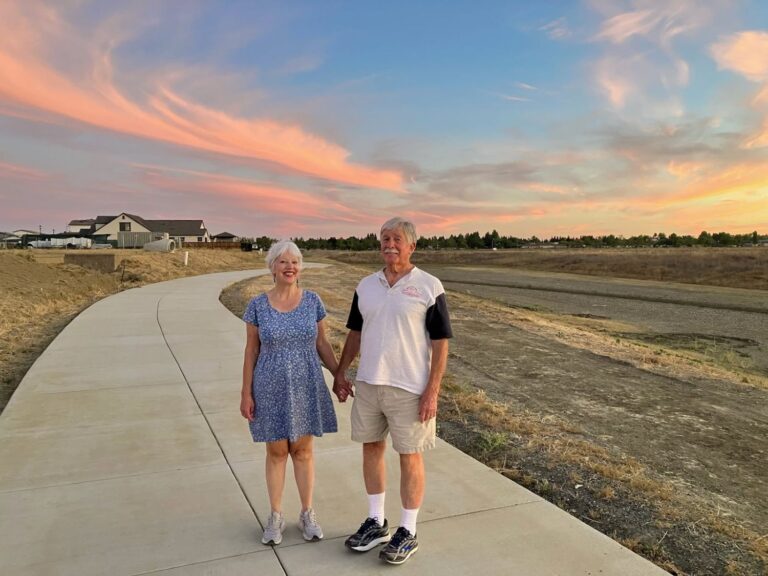 Author Steven T. Callan and his wife, Kathy, walking on a trail near their new home.